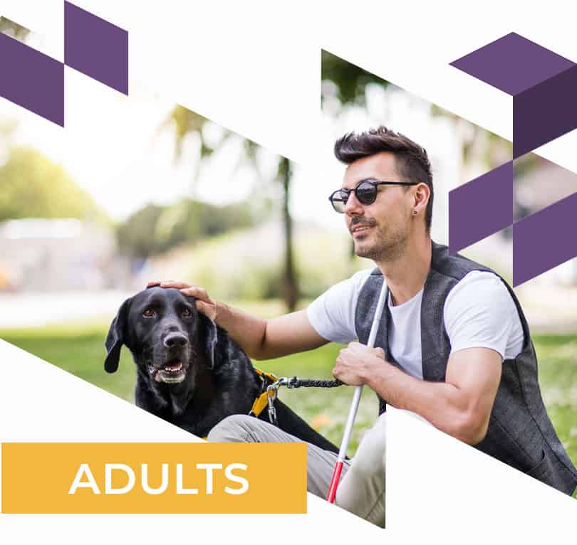 Blind man with service dog.